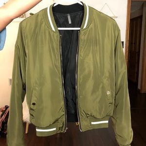 Varsity style, green bomber jacket.
